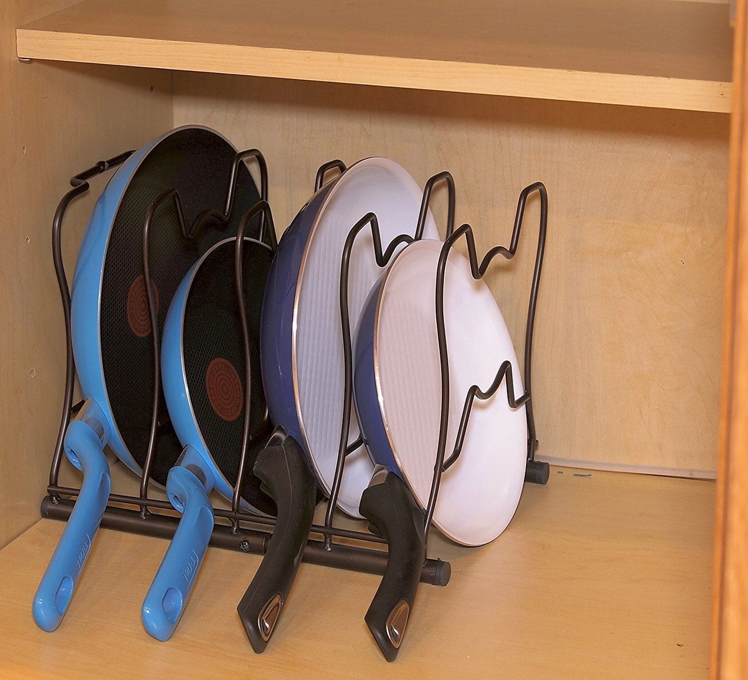 How to Organize your Pots and Pans - Make your cabinet space more efficient with these tips - In cabinet pot holder
