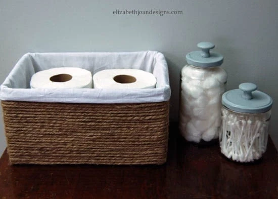 14 Awesome Bathroom DIYs - Turn a box into a Basket