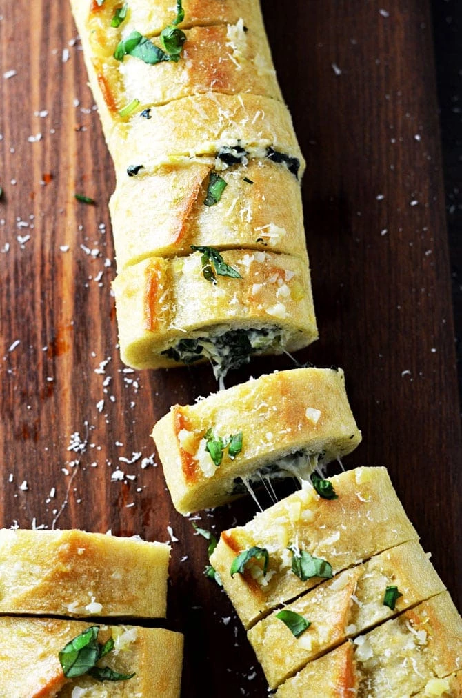 42 Amazing Super Bowl Appetizers - Spinach and Artichoke Dip Stuffed Garlic Bread