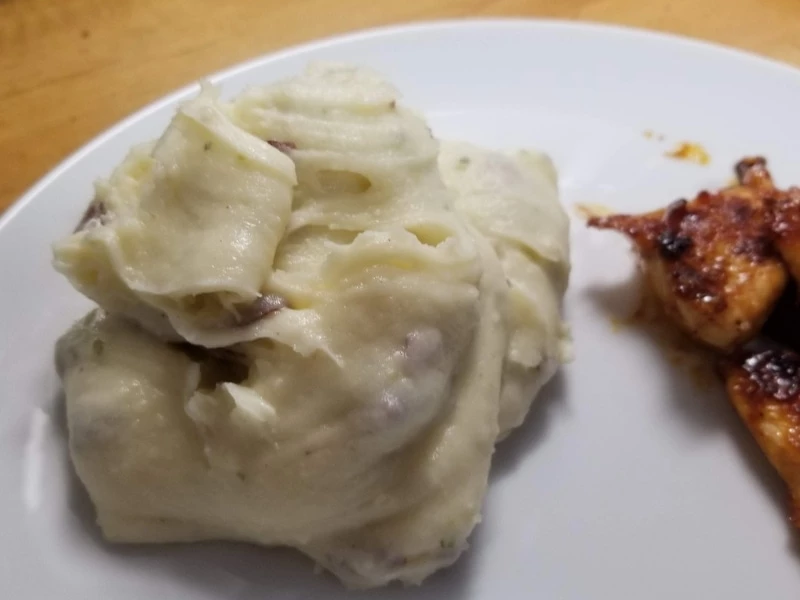 Cheesy Instant Pot Mashed Potatoes on white place