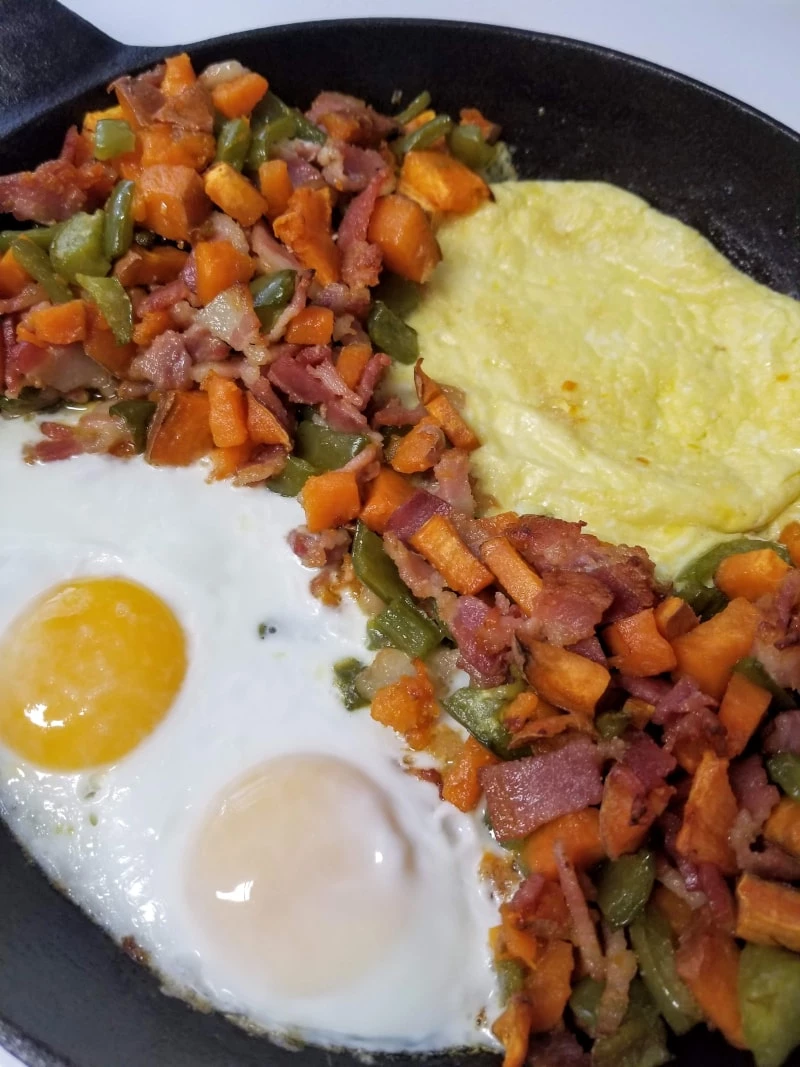 Sweet Potato Hash with 2 Different Styles of Eggs In Cast Iron Skillet