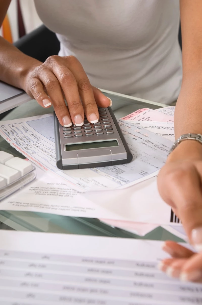 Woman doing calculations for a budget