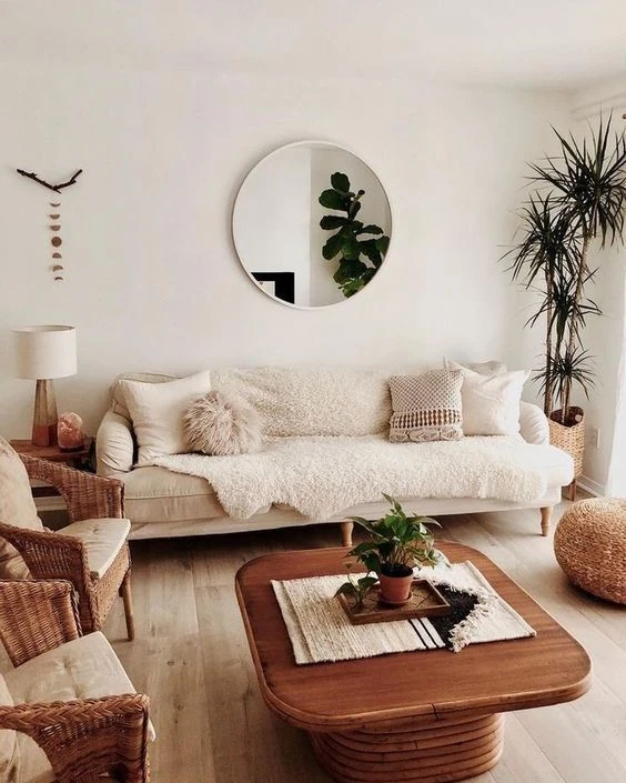 A Scandinavian styled living room with a blend of soft and woven textures and minimalist and modern style furniture.