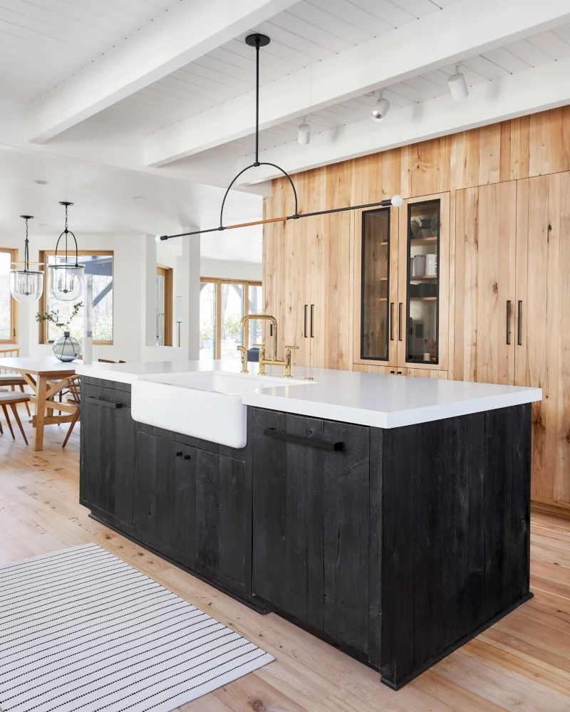 A Scandinavian styled kitchen with recycled wood and raw edges.