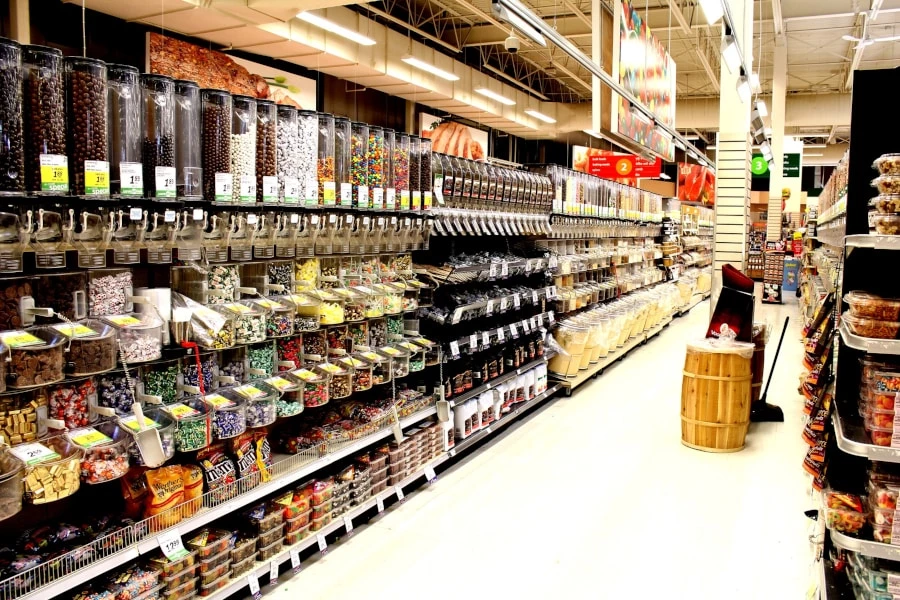 grocery store aisle with bulk product dispensers