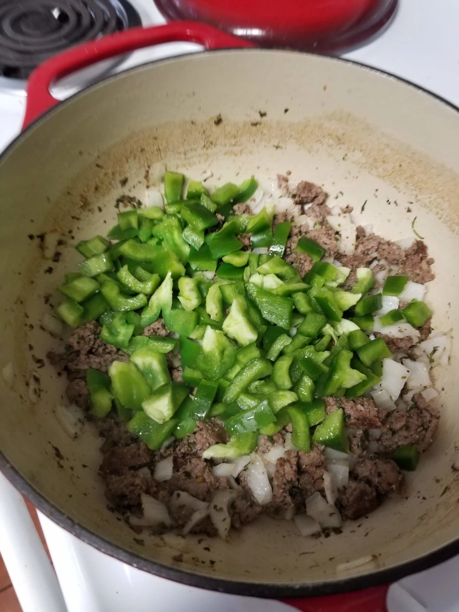 cooked ground beef with diced green pepper and onion for stuffed pepper soup