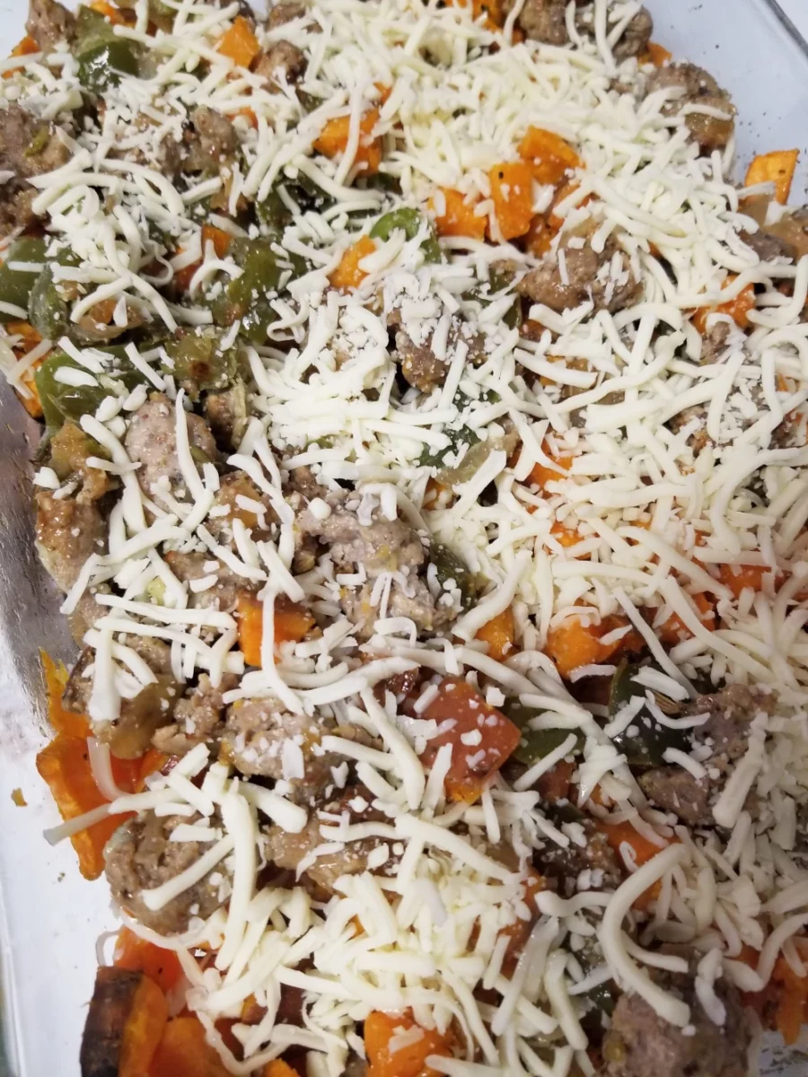 3 - Italian sausage, green pepper and onion added to sweet potatoes and covered with cheese