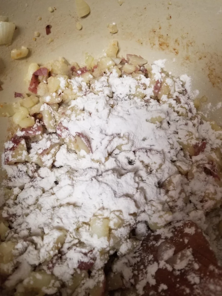 9 - Flour sprinkled over potatoes and onions