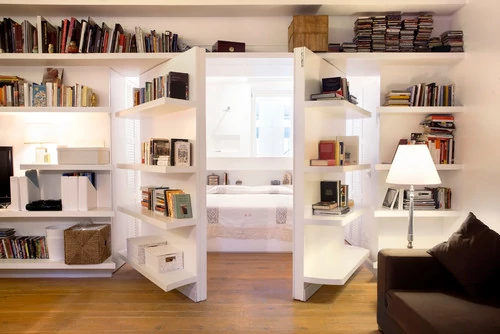 Hidden Reading Nook Behind Bookshelves