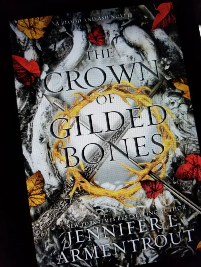 The Crown of Gilded Bones Book Cover on Tablet