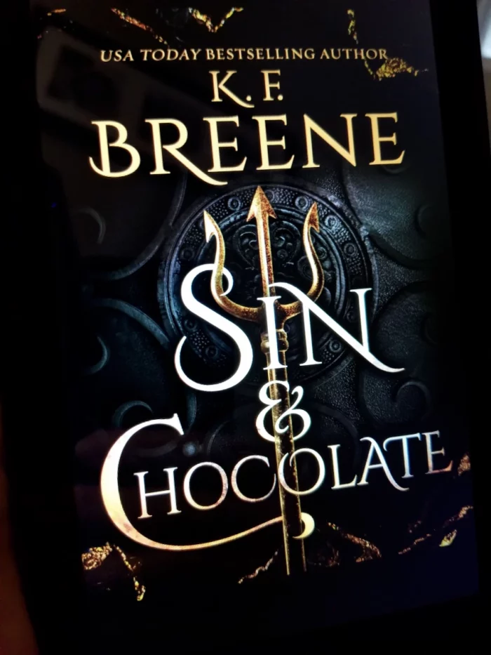 Sin and Chocolate book cover on tablet
