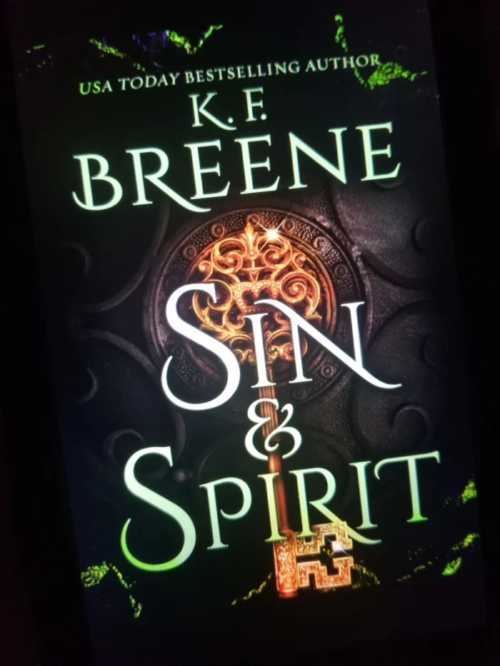 Sin and Spirit book cover on tablet