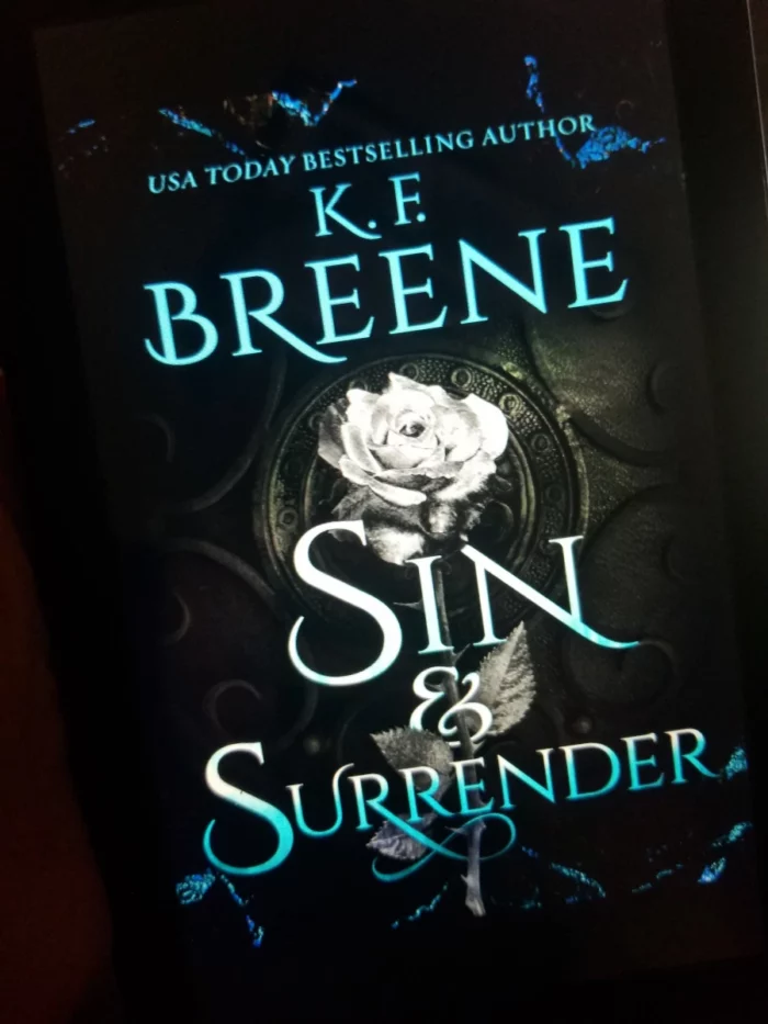 Sin and Surrender book cover on tablet