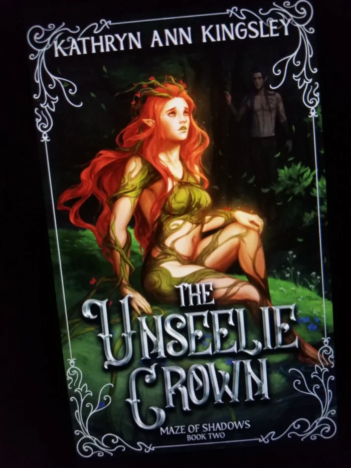 The Unseelie Crown book cover on tablet