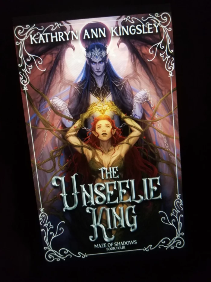 The Unseelie King book cover on tablet