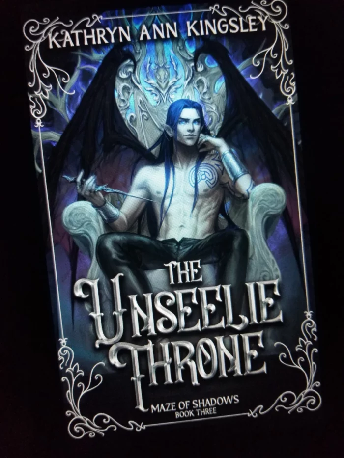The Unseelie Throne book cover on tablet